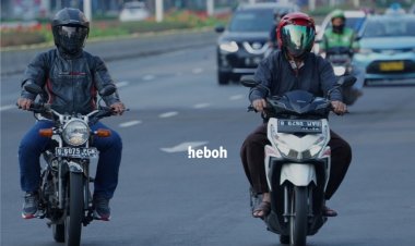 Naik Motor sambil Ngobrol Bisa Kena Denda Rp750 Ribu